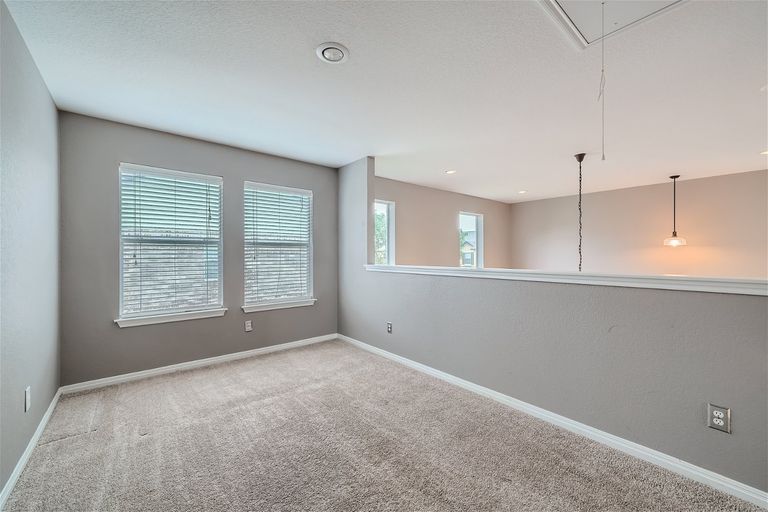 1900-little-elm-trail-67---web-quality---010---14-2nd-floor-landing.jpg
